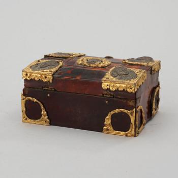 A Baroque 18th century tortoiseshell veneered casket.