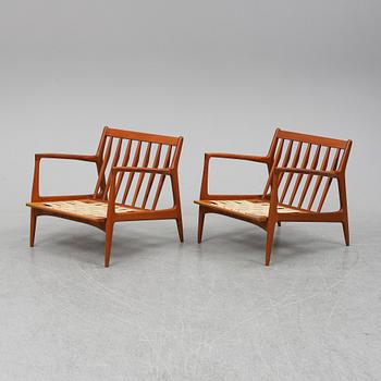 A pair of late 20th Century easy chairs.