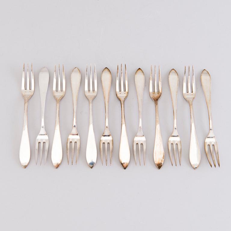 A 1920s 88-piece set of silver cutlery and 12 knife handles, Warsaw Poland.