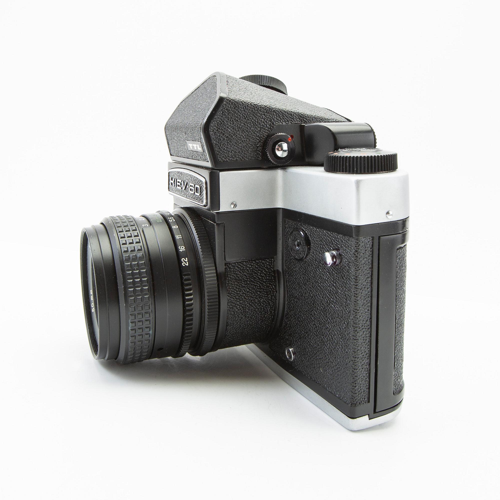 Camera, Kiev 60, and 3 lenses.