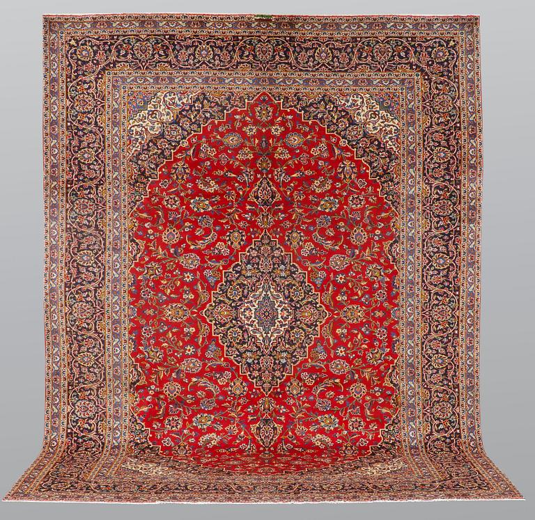 A carpet, Kashan signed, ca 385 x 293 cm.