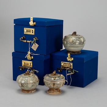 A set of three Sawankhalok boxes with covers, 15th / 16th Century.