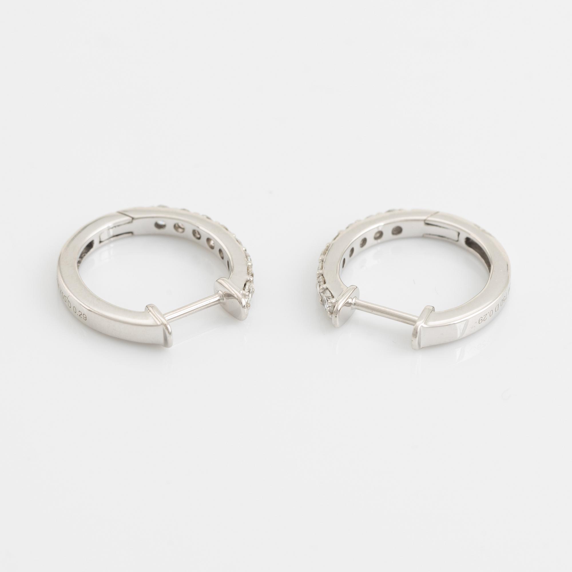 Brilliant cut diamond hoop earrings, total 0,58 ct.