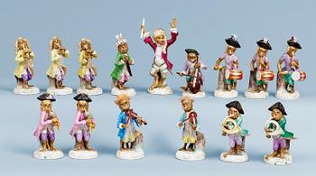 1242. A part monkey orchestra, Meissen like mark. (15 pieces).