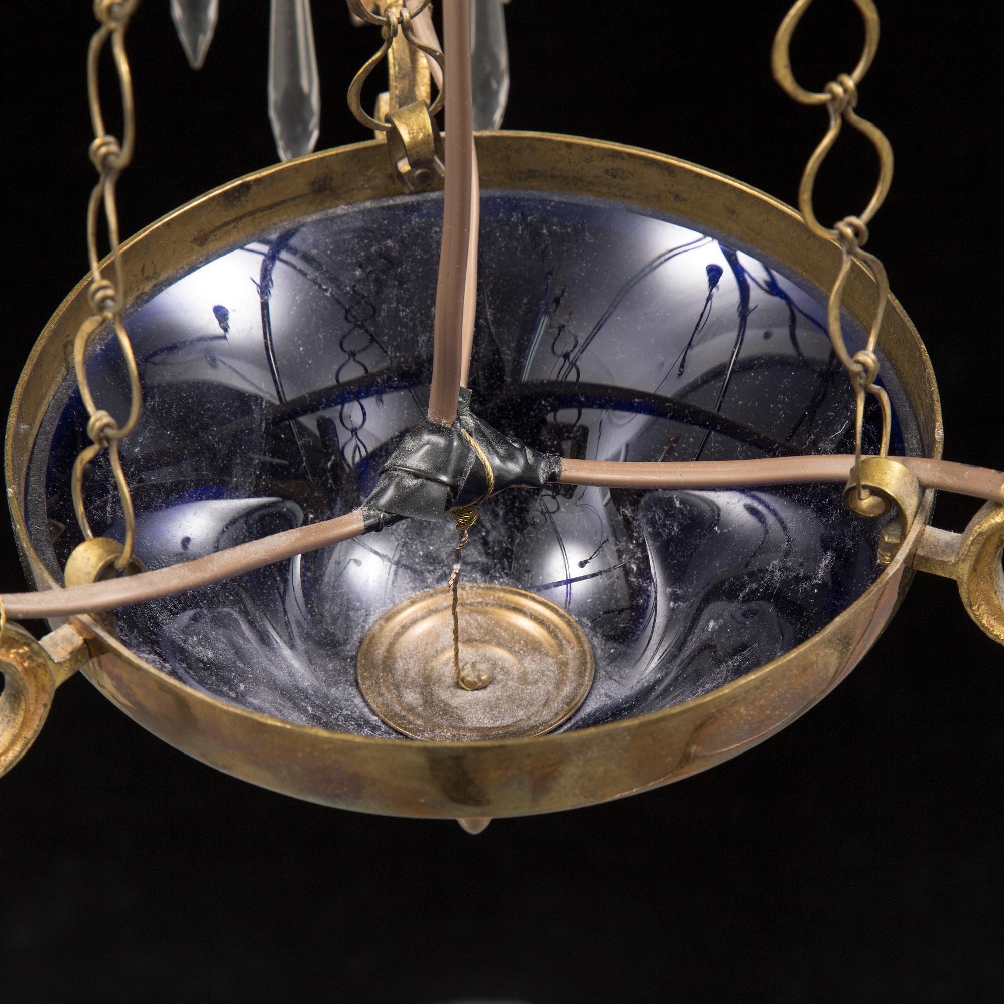 A MID 19TH CENTURY LAMP.