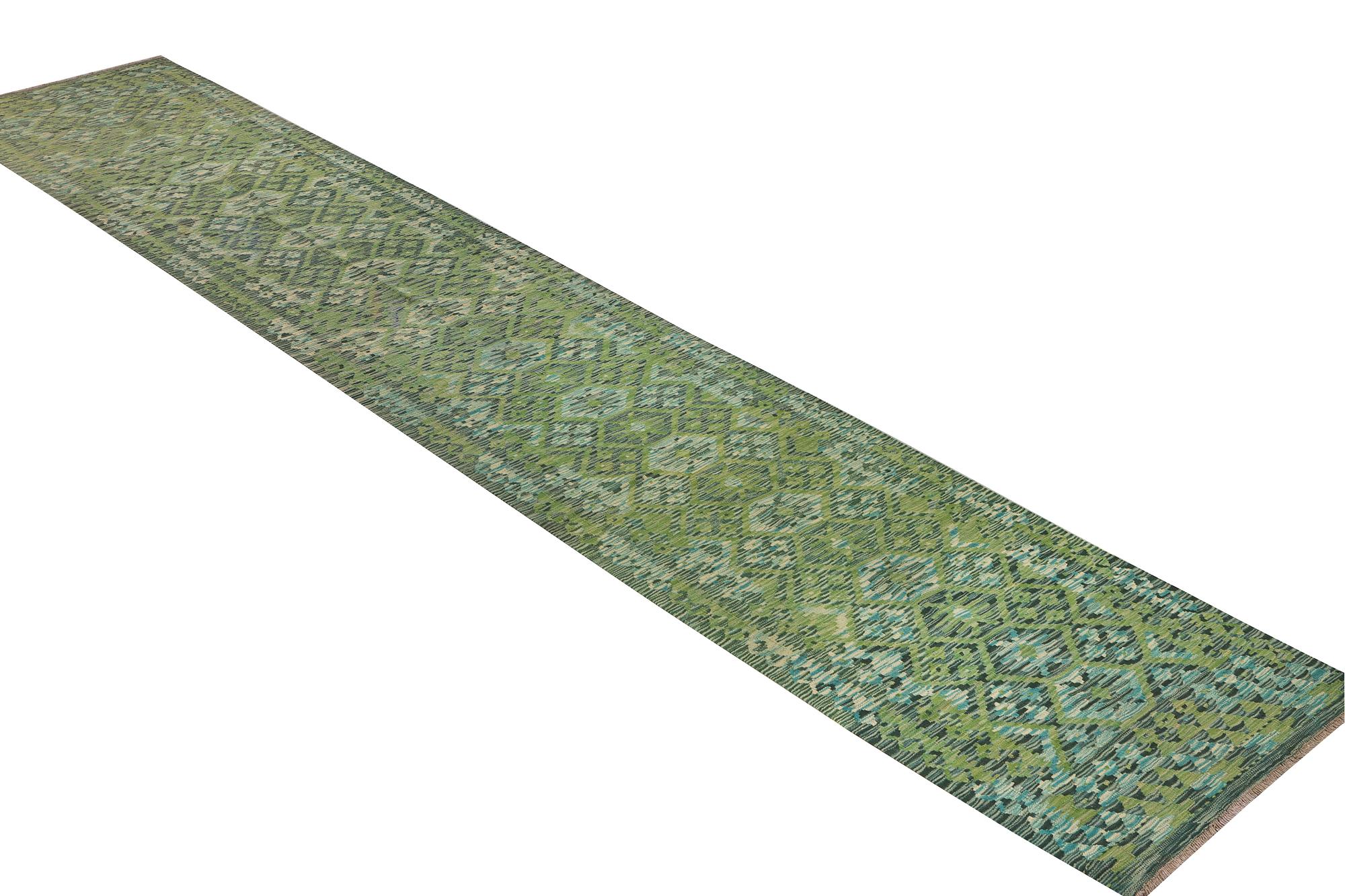An Afghan kilim runner, c. 488 x 79 cm.