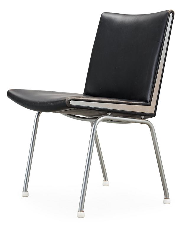 A Hans J Wegner 'Kastrup' steel and black leather chair, AP-stolen, Denmark.