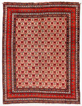 An antique Indian carpet, c 390 x 299 cm.