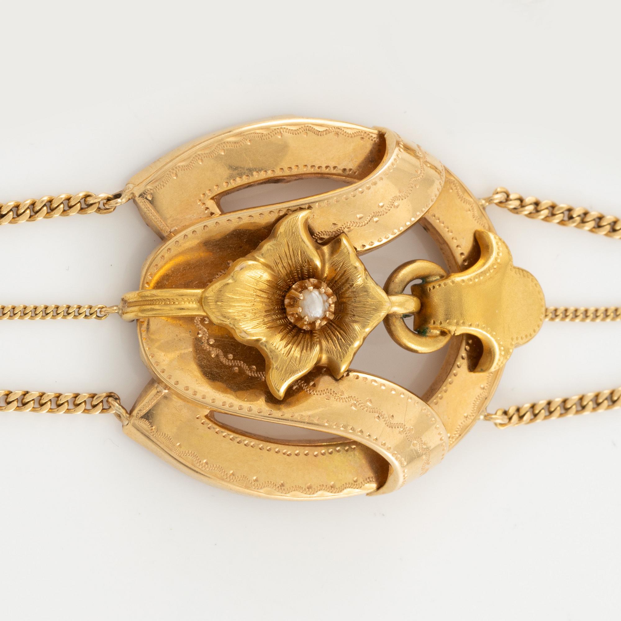 Bracelet 18K gold and a pearl.