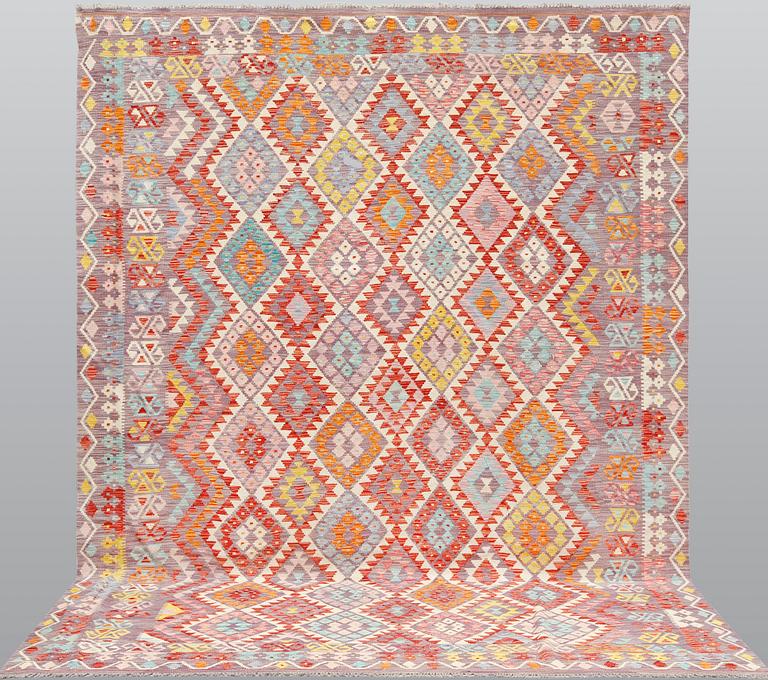 A kilim carpet ca 338 x 256 cm.