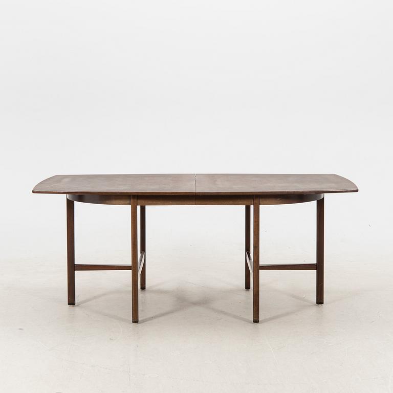 A table and four chairs in lacquered mahogany by David Rosén, "Triva-diné", middle of the 20th century.