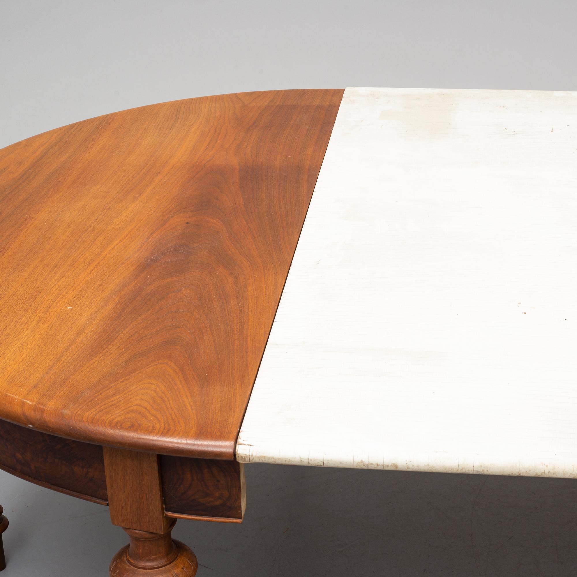 A DINING TABLE, second half of the 19th century. 5 painted leaves included.