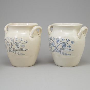 A set of four 20th century blue and white jars by Rörstrand.