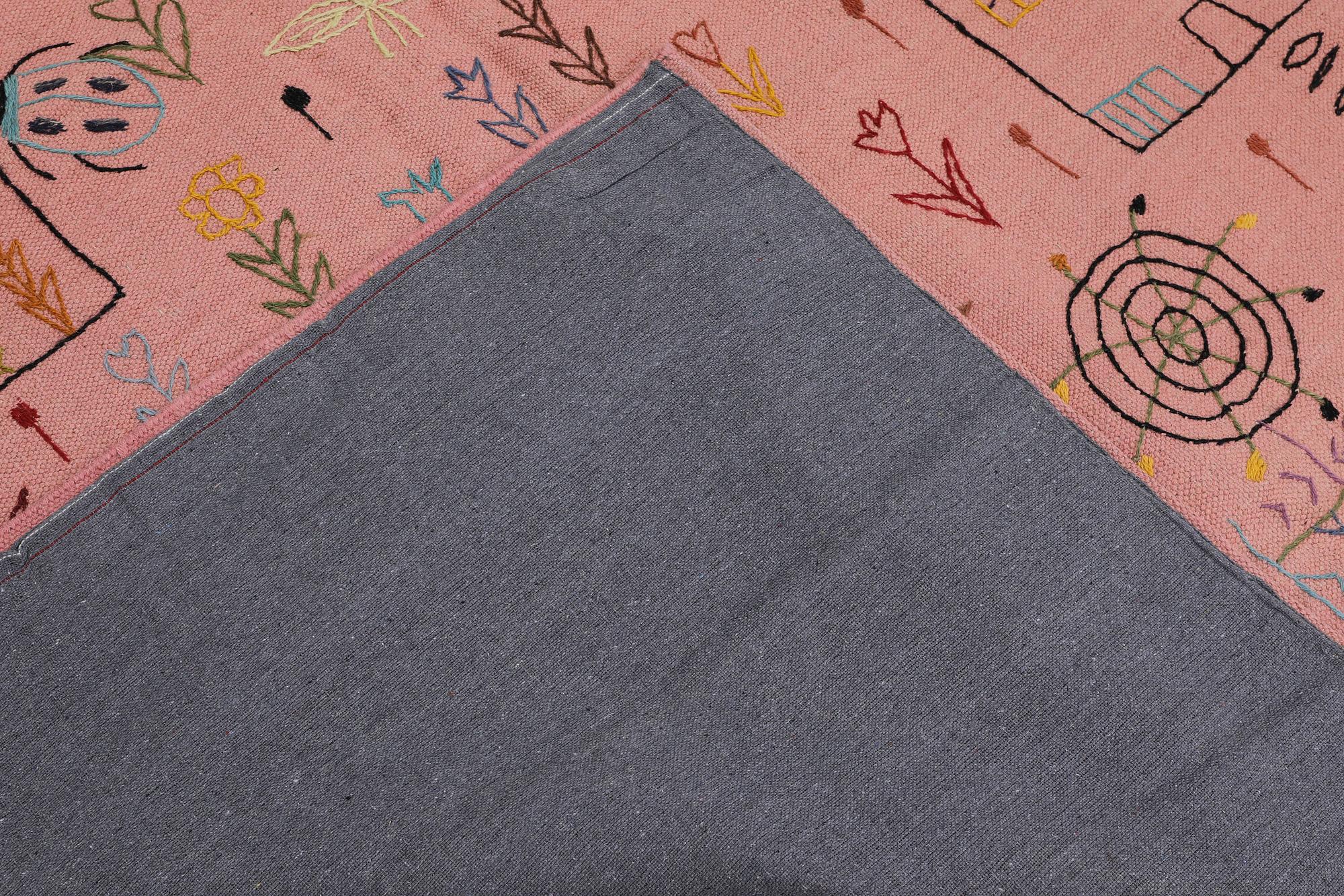 A Kilim carpet with hand-embroidered decoration, 237 x 180 cm.