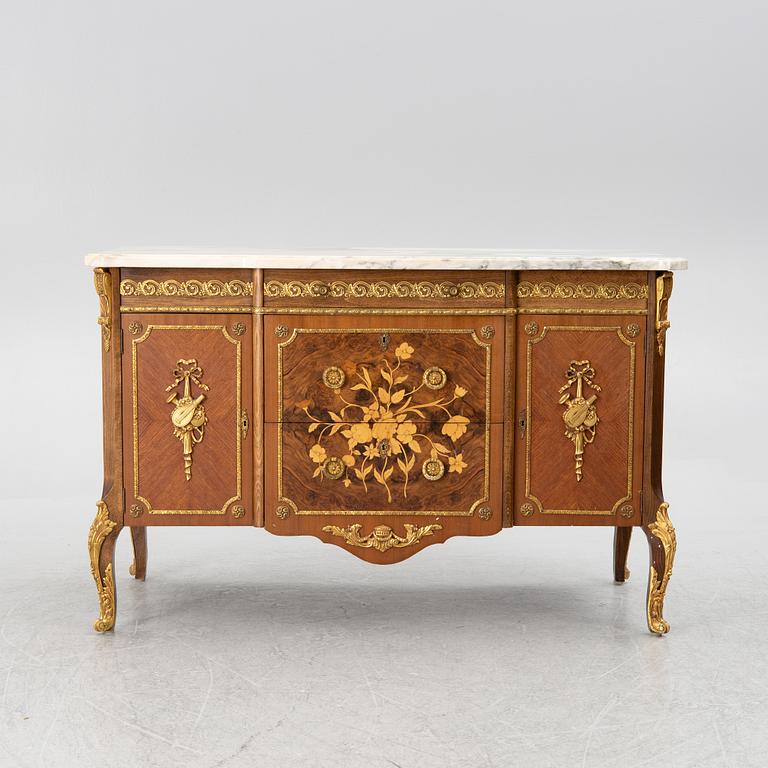 A chest of drawers, Louis XVI style, mid 20th Century.