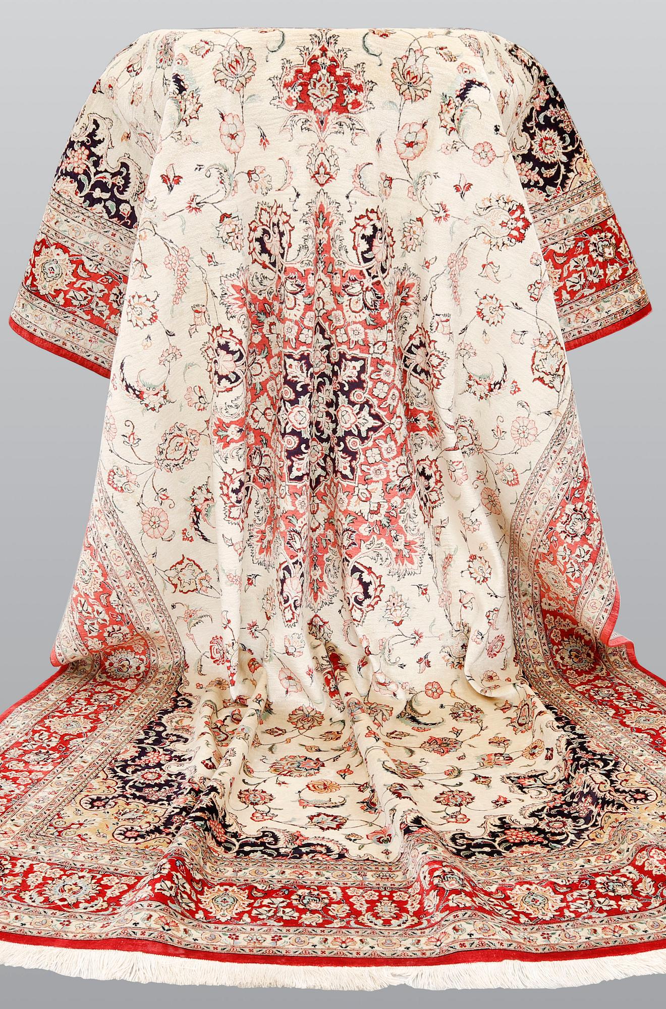 A silk Ghom carpet, 295 x 195 cm.