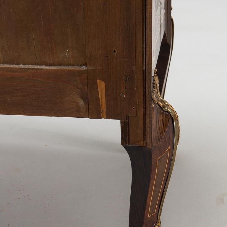 A Swedish Louis XVI-style chest of drawers, signed Arthur Karlström, Lysekil, Sweden, dated 1946.