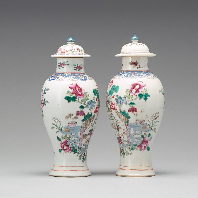 A pair of famille rose vases with covers, Qing dynasty, Qianlong (1736-95).