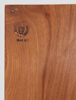 An Oscar Nilsson cabinet, by canbinetmaker Georg Ryman, for Stockholm Stads Hantverksförening, dated 1943.
