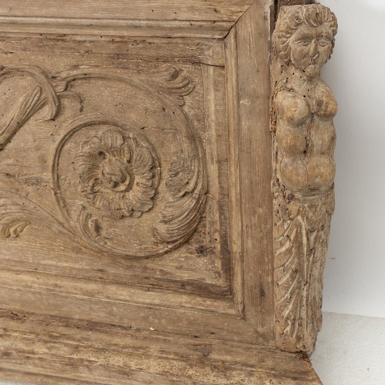 An Italian carved baroque panel, 17th / 18th century.