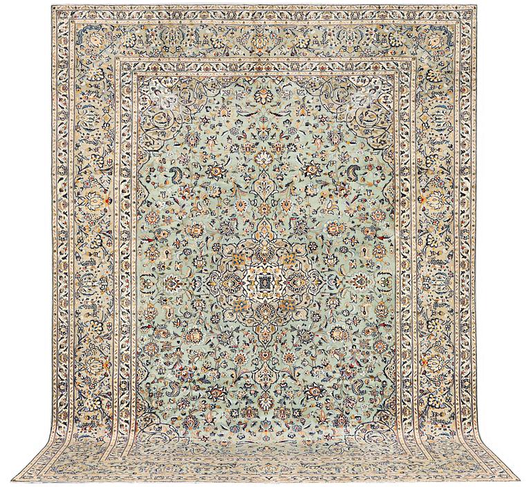 A Kashan carpet, c. 402 x 293 cm.