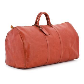 LOUIS VUITTON, a brick red epi weekend bag, "Keepall 60".