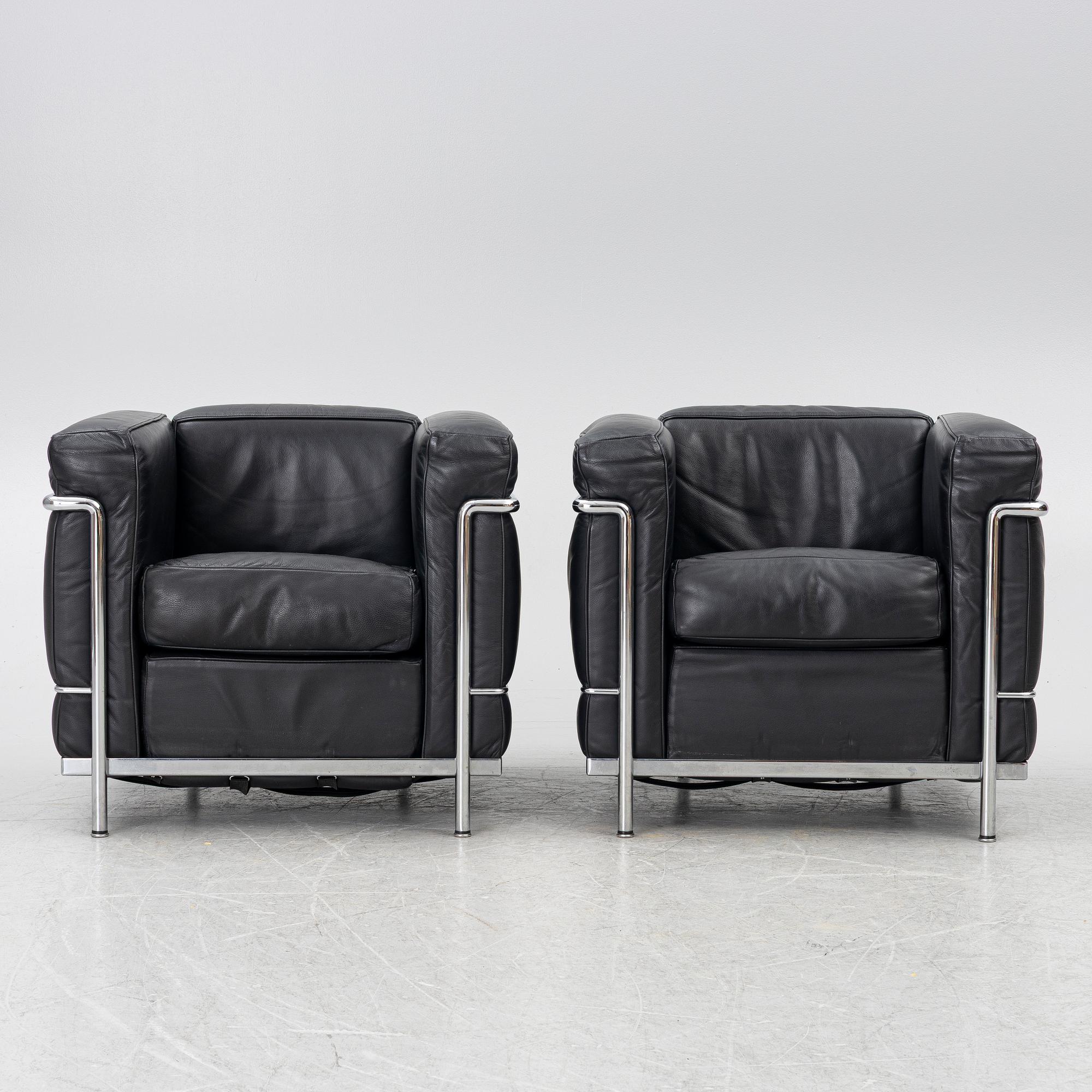 Le Corbusier (Charles-Édouard Jeanneret), Pierre Jeanneret, Charlotte Perriand & Le Corbusier, a pair of 'LC2' armchairs, Cassina.