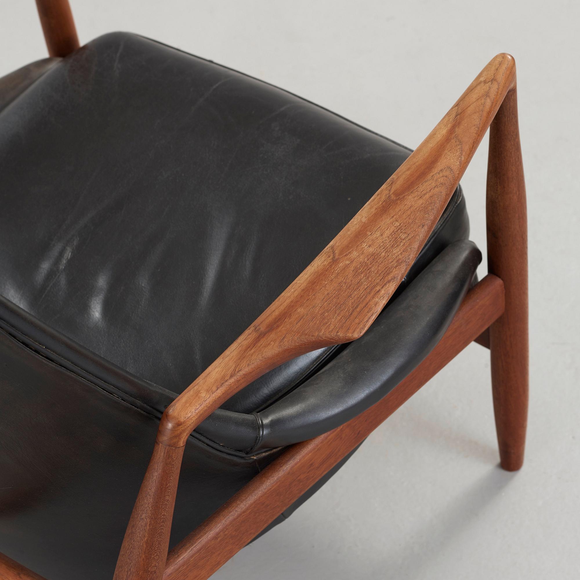 Ib Kofod-Larsen, a 'Seal' teak and black leather armchair, Olof Persson Möbler, Jönköping, Sweden 1950's-60's.