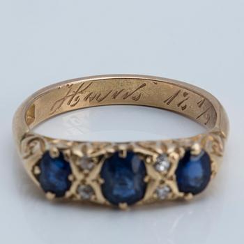 A sapphire and old-cut diamond ring, 1908.