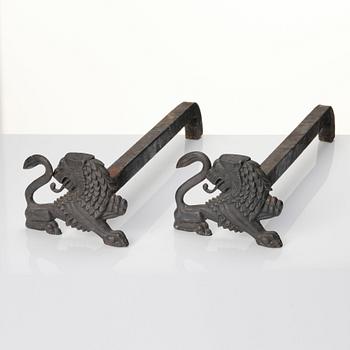 Anna Petrus, a pair of brass and iron andirons, Svenskt Tenn Sweden.