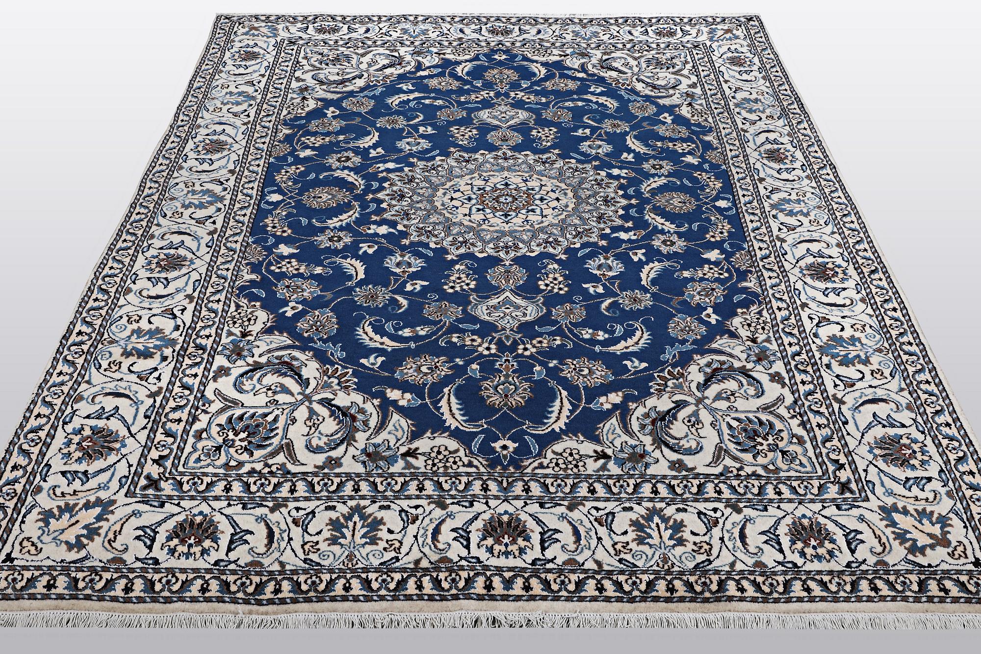 A carpet, Nain, part silk 9 LAA, ca 310 x 203 cm.