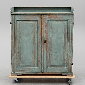 A first half of the 19th century painted cupboard.