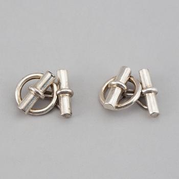 HERMÈS, a pair of silver cuff links.