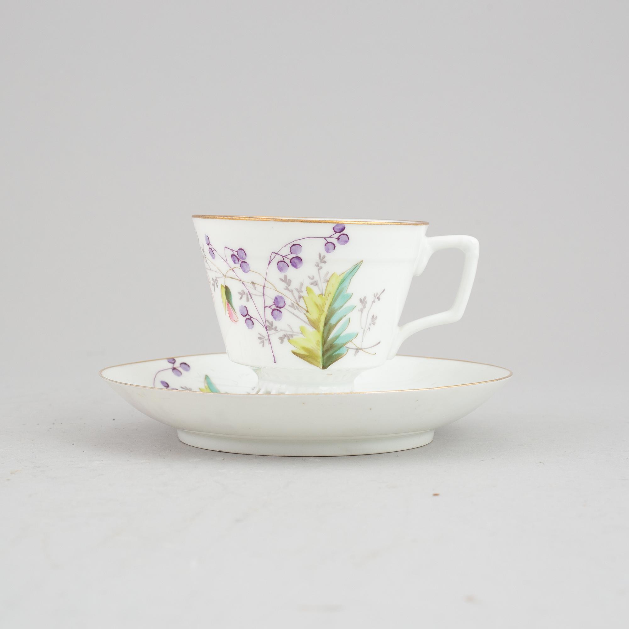 Eight porcelain coffeecups with saucers, Kusnetsov, Russia, around 1900.