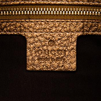 A Gold Leather Hasler Horsebit Hobo Bag.