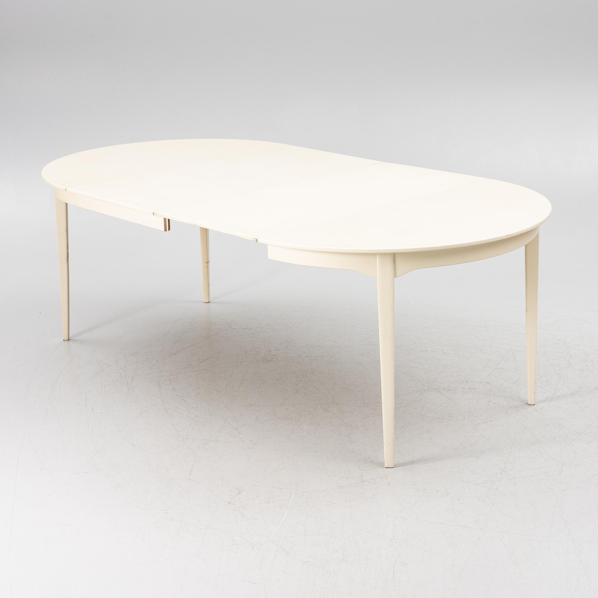 Carl Malmsten, a dining table with six chairs, end of the 20th century.