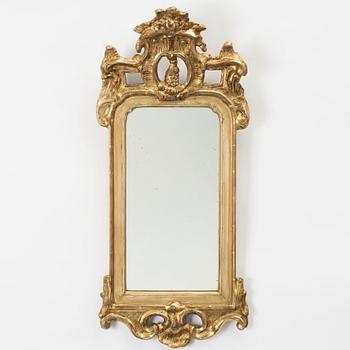 A Swedish rococo giltwood mirror, Stockholm, later part 18th century.