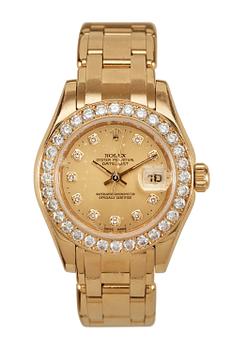 826. A Rolex 'Pearl master' ladie's wrist watch, c. 2000.