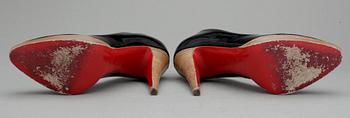 SKOR, ett par pumps, Christian Louboutin.