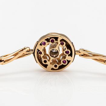Armband, 14K guld, rubiner, diamant ca 0.11 ct.