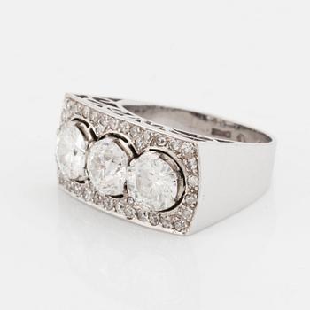 An 18K white gold ring set with old- and eight-cut diamonds.