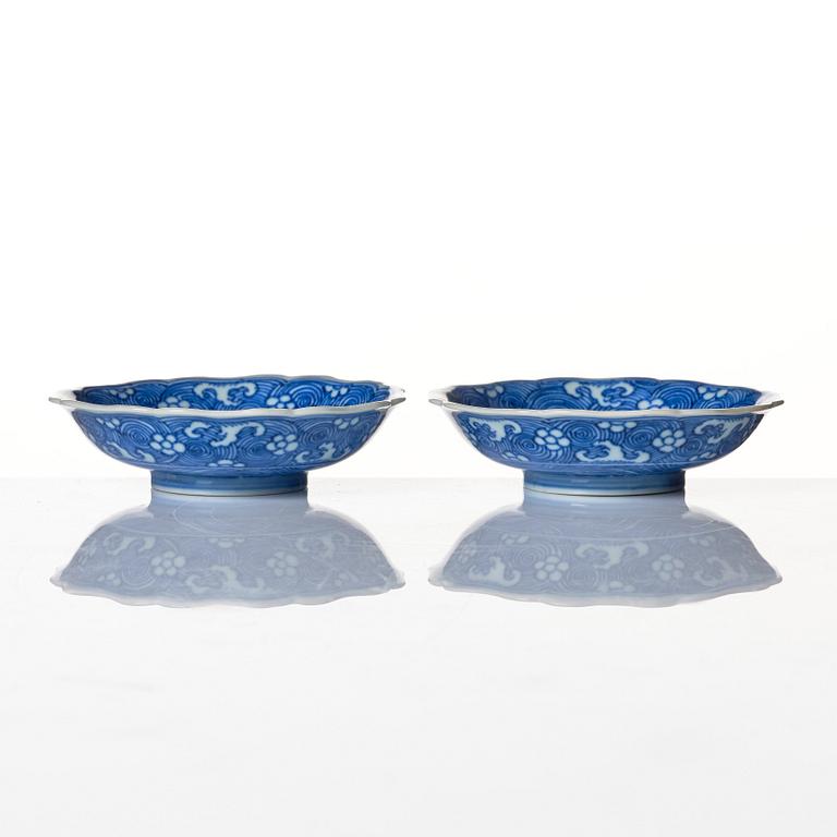 A pair of blue and white lobed dishes with flying horses, Qing dynasty, Kangxi (1662-1722).