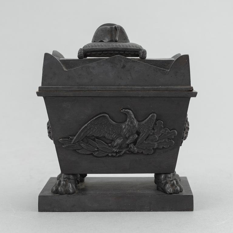 A cast iron inkwell in the form of the sarcophagus of Napoleon, Königliche Preußische Eisengießerei, Berlin, ca. 1815-20.