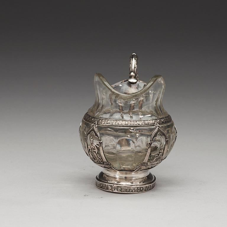 A Russian 19th century glass and silver cream-jug, unidentified makers mark, St. Petersburg 1834.