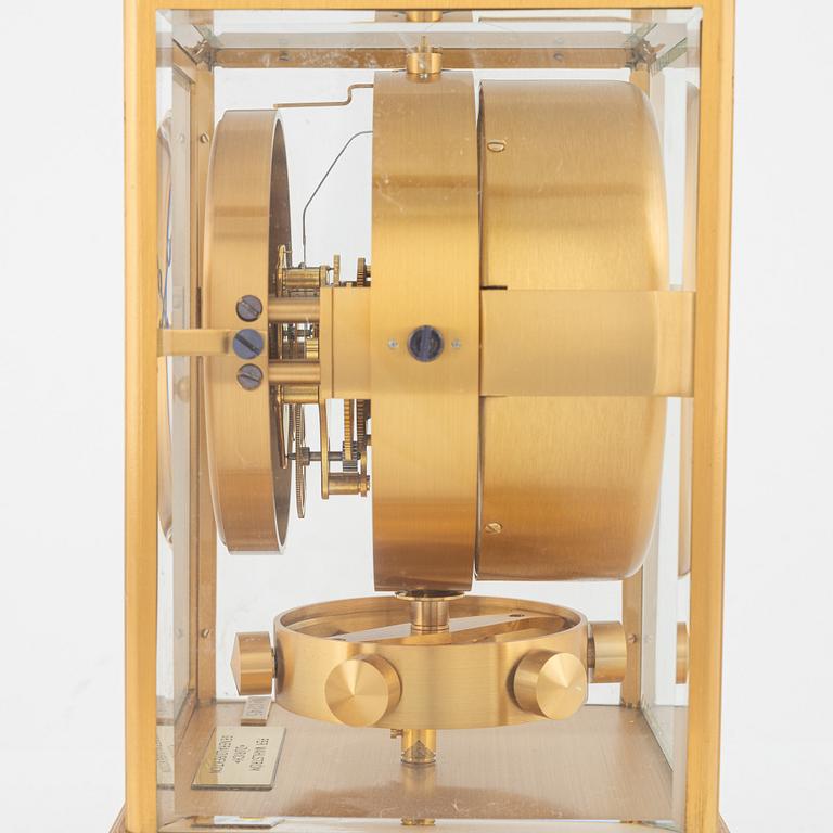 Jaeger LeCoultre, an Atmos table clock.