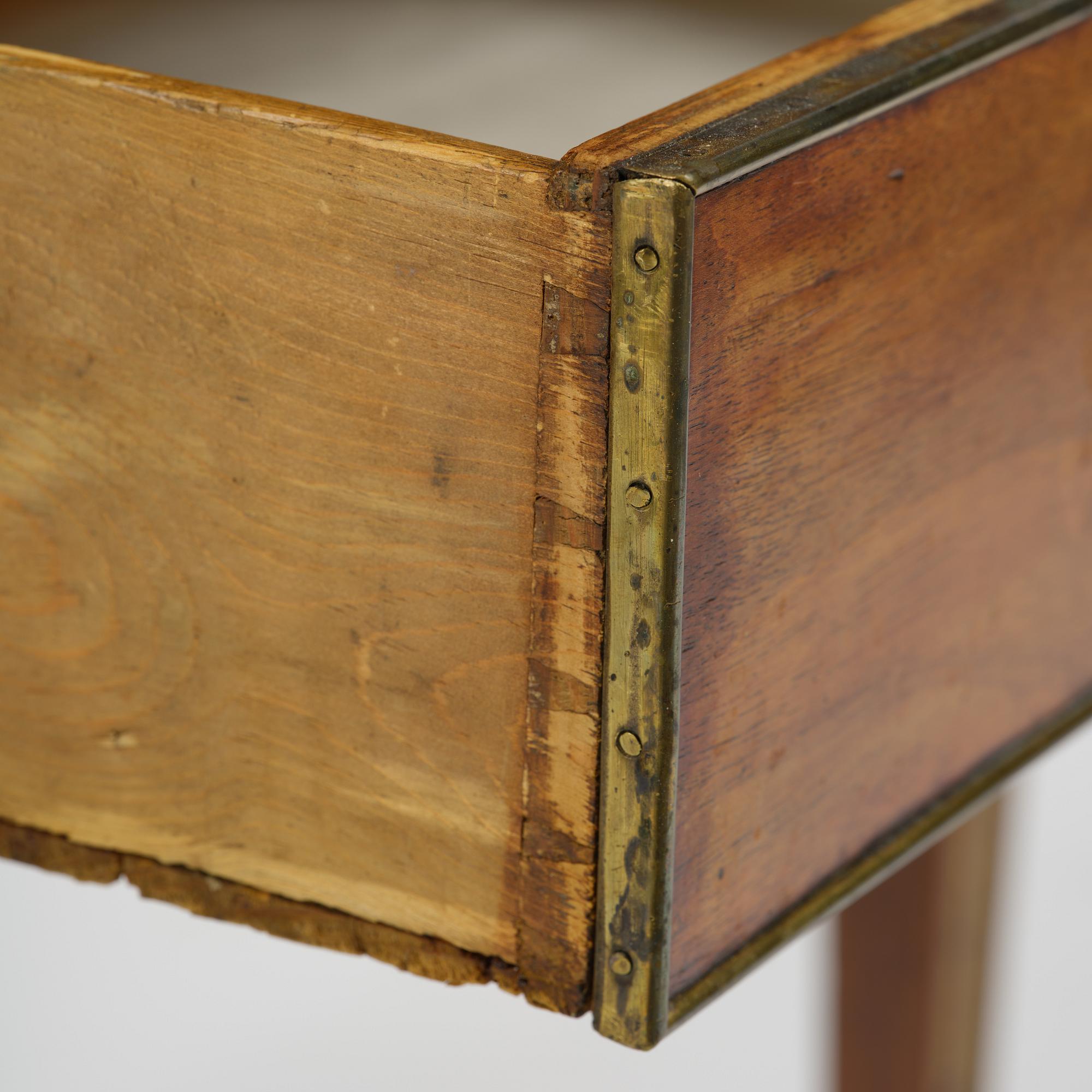A late Gustavian mahogany chamberpot cupboard, circa 1800.