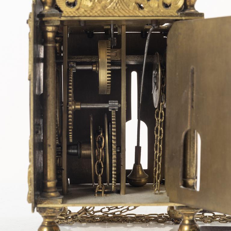 A George II brass lantern clock by John Wainwright (watchmaker in Wellingborough 1738-51).