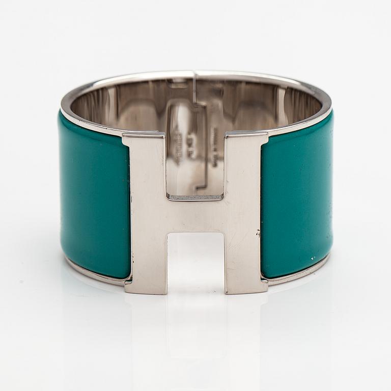 Hermès, A "H click" bracelet made of metal and enamel. Marked Hermès, S, Made in France.