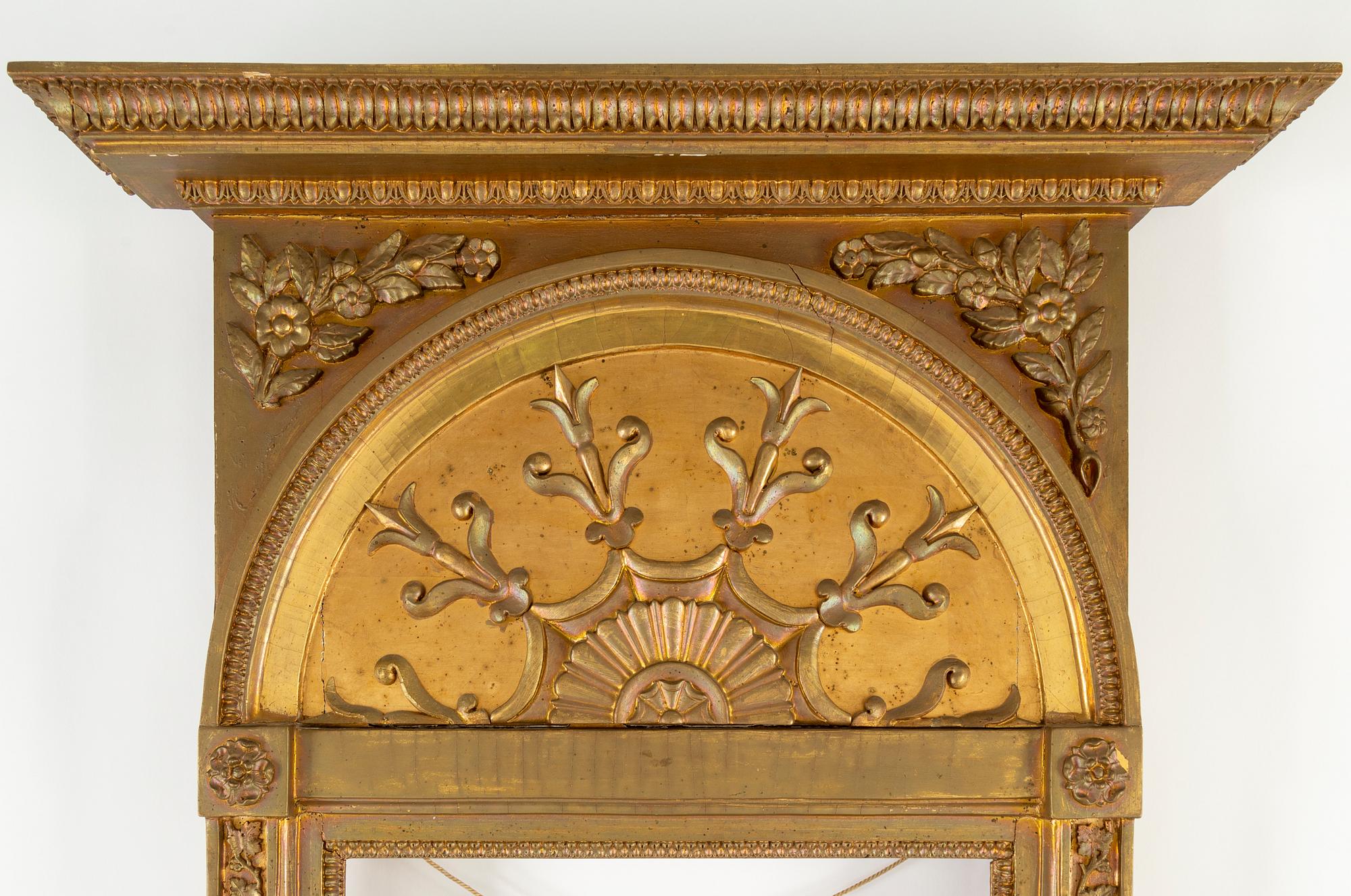 A Swedish Empire Mirror frame and console table, first half of the 19th century.