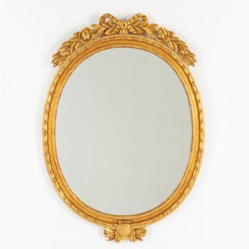 A Gustavian style mirror, mid 20th Century.